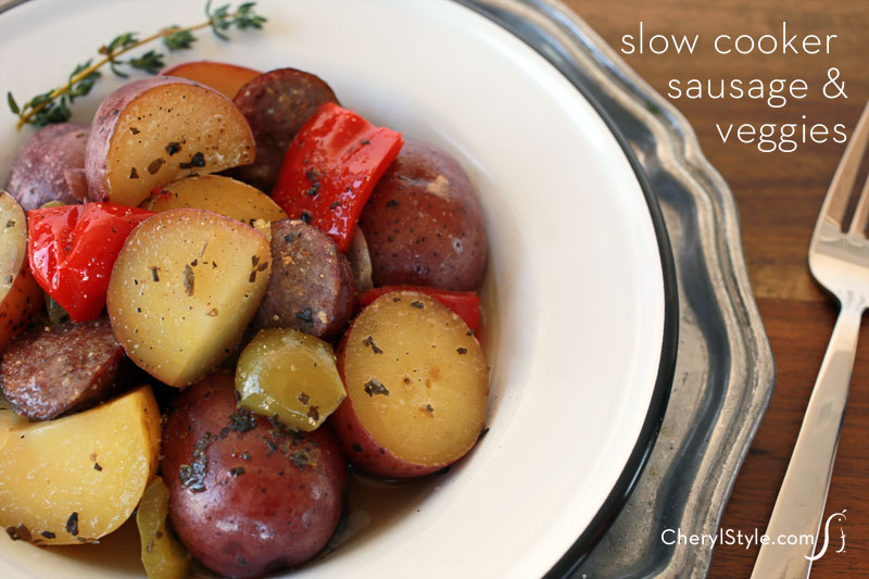 Easy slow cooker sausage and potatoes with veggies, basil and thyme