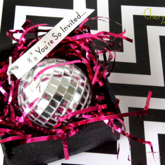 3D New Year’s Eve party invitations that look like a disco ball.