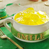 Some gold Jello coins, in a little "pot," a cute and fun St. Patrick's Day dessert.