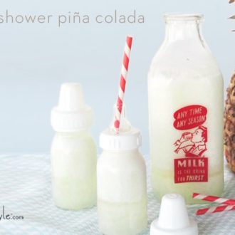 Pina Coladas served in baby bottles. A fun baby shower cocktail.