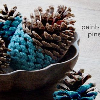DIY paint dipped pine cones to use as a centerpiece.