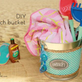 A DIY beach bucket to hold everything you need for a day at the beach.