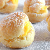 A batch of delicious, homemade mini cream puffs.