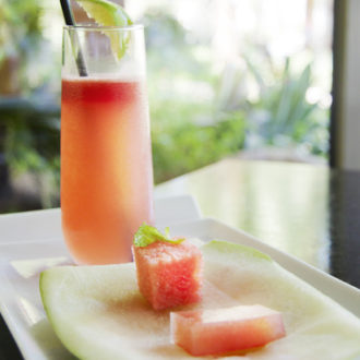 A glass full of a refreshing watermelon cocktail