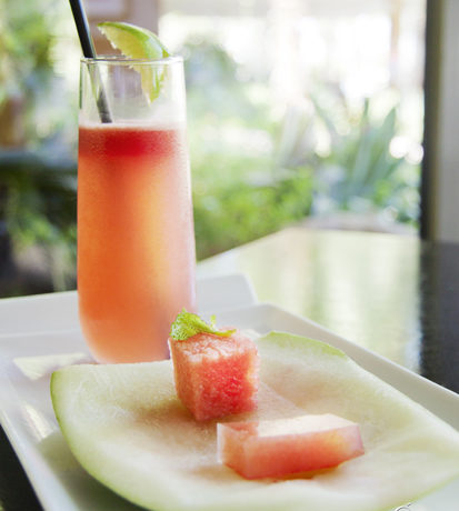 A glass full of a refreshing watermelon cocktail