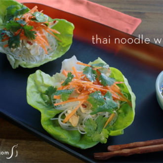 Easy Thai lettuce wraps with chicken and rice noodles, on a plate and ready to serve.