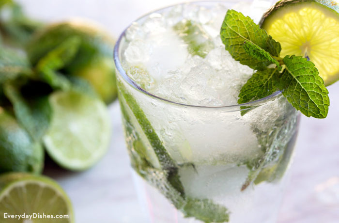 A refreshing skinny coconut mojito that's garnished with mint and lime.
