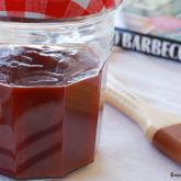 A jar of tangy, homemade BBQ sauce.
