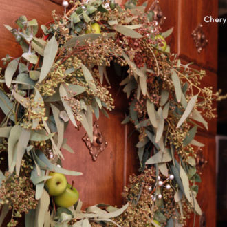 This DIY seasonal crab apple wreath makes a rustic decoration.
