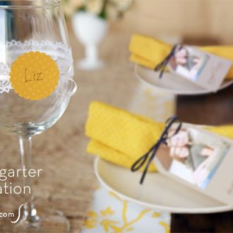 Personalized DIY bridal shower wine glasses with garter placecards.