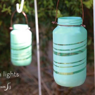 DIY painted upcycled garden lights.