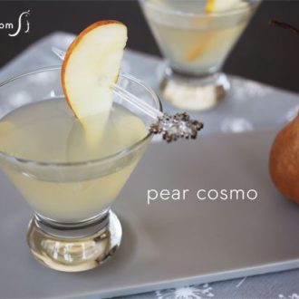 A cup full of a delicious pear cosmo with white cranberry juice cocktail