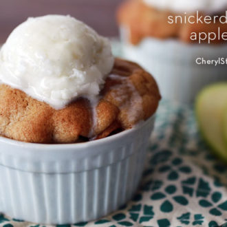 A personal snickerdoodle apple crisp, topped with a scoop of ice cream.