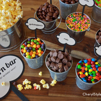 A DIY popcorn bar with printable labels.