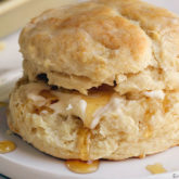 An easy buttermilk biscuit, with melted butter and honey in the middle.