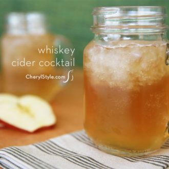 A refreshing ginger beer cider cocktail in a mason jar glass.