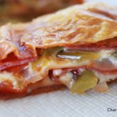 A delicious puff pastry pizza pocket, ready to enjoy