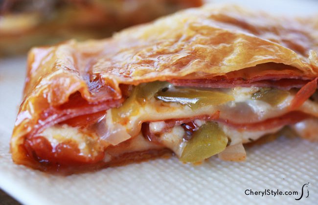 A delicious puff pastry pizza pocket, ready to enjoy