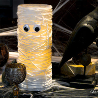 A DIY mummy vase, a spooktacular Halloween decoration.