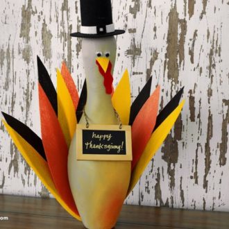 A DIY bowling pin turkey — a fun Thanksgiving craft!