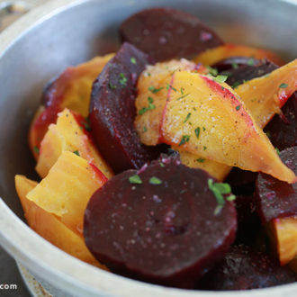 A bowl of beets that were roasted in a dutch oven.