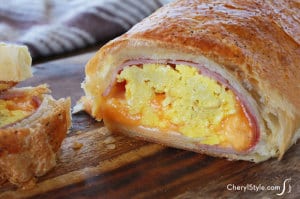 Easy breakfast stromboli with ham, scrambled eggs and cheese