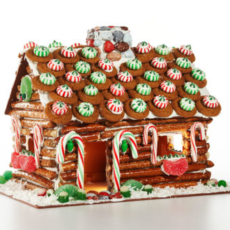 Don’t bake! Just decorate a plastic gingerbread house from Candy Cottage!