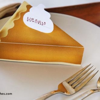 A DIY printable pumpkin pie place card filled with treats.