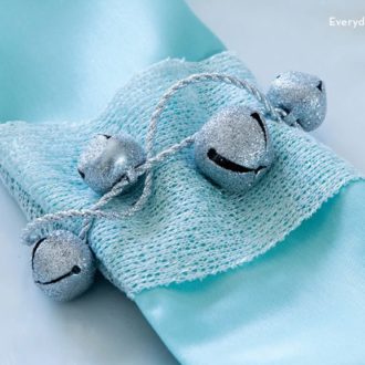 A DIY blue and silver frosted unique holiday napkin idea.