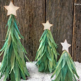 Three corn husk Christmas trees, a fun DIY decoration.
