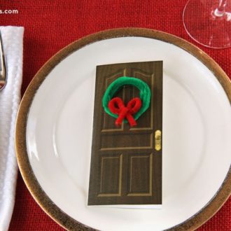 Greet guests with DIY Christmas card place settings.