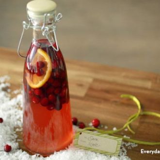 A bottle of a homemade cranberry orange vodka – a unique gift idea