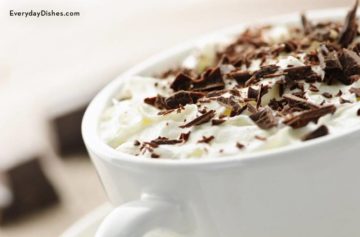 Hot cocoa with shaved chocolate and whipped cream