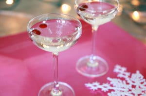 Add a playful twist on your traditional cosmo with a pop of cranberry flavor and homemade #GingerSyrup! This #WhiteCranberry holiday cocktail recipe adds a little sophistication to happy hour. Visit Everyday Dishes & DIY.com for this #cosmo recipe