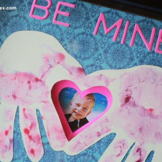 A handprint heart card is the perfect personalized Valentine’s Day gift.