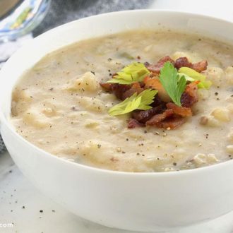 Creamy potato soup, served up in a bowl and ready to enjoy