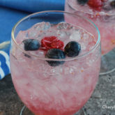 Two glasses of a refreshing mixed berry spritzer