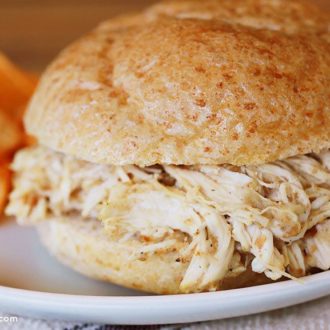 A sandwich made with slow cooker shredded chicken