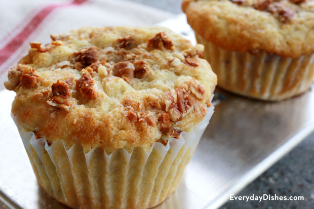 Two of the most deliciously crunchy banana nut muffins with granola ever