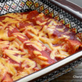 A pan of creamy chicken enchiladas, a great use for leftover chicken.