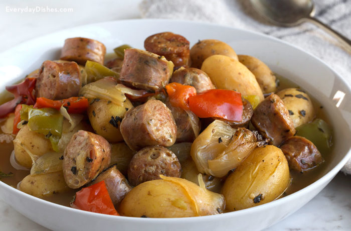 A serving of slow cooker sausage and potatoes — a hearty and filling dinner.