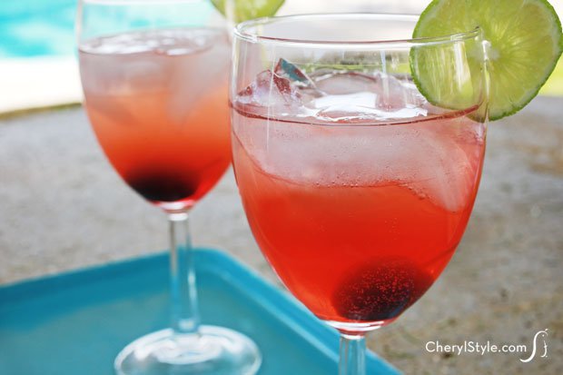 Two glasses of a refreshing and simple vanilla cherry limeade cocktail.