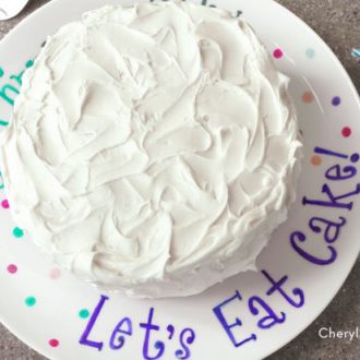 A DIY personalized birthday plate with a cake.