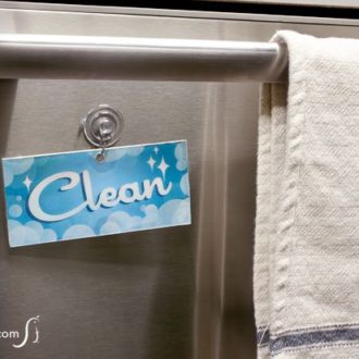 A printable DIY clean/dirty dishwasher sign that tells everyone when to load or unload.