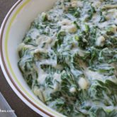 A bowl full of creamed spinach