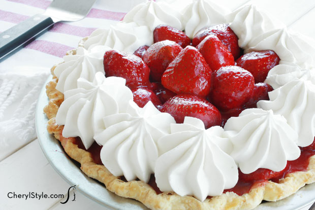 A delicious homemade fresh strawberry pie that's ready to serve for dessert.