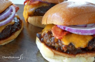 Bite into a smoky whiskey BBQ burger with thick cut bacon and cheddar!