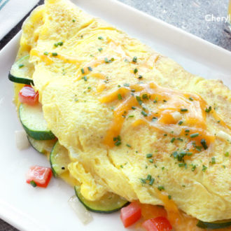 Grab some eggs and make an American-style omelet recipe! Making an omelet couldn’t be easier, as long as you know the proper steps to ensure success.
