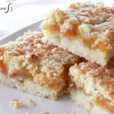 A batch of fresh peachy keen bars that are sliced into servings for a tasty summer snack!