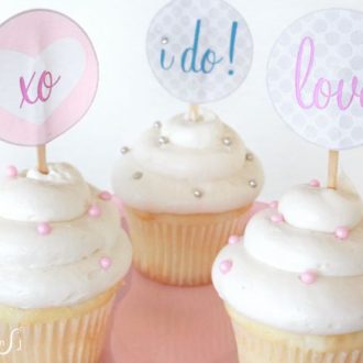 Cupcakes with DIY printable toppers — cute decorations for a bridal shower.